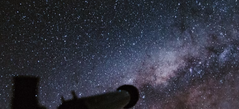 A telescope and stars