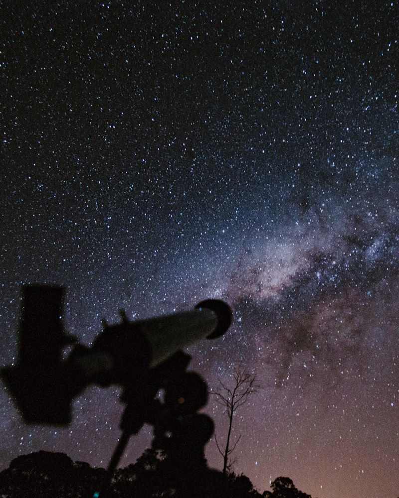 A telescope and stars