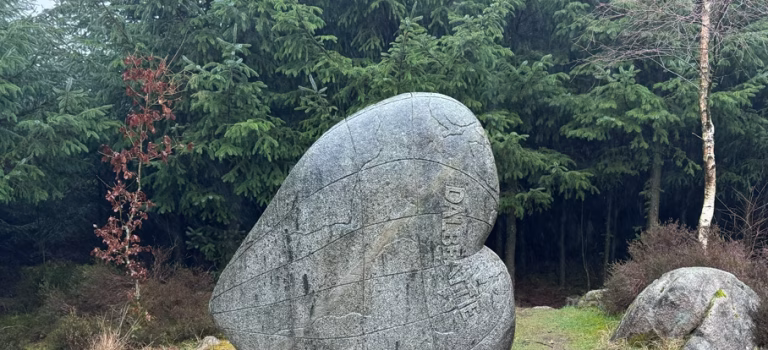 The granite Heart Stane monument along the 7stanes trails in Dalbeattie Town Wood for hiking or mountain biking.