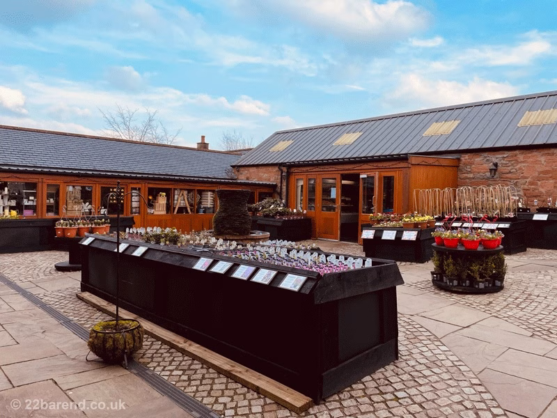 Courtyard and flowers in converted farm courtyard