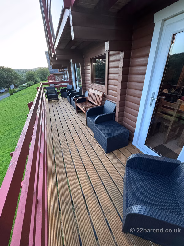 Serenity 22 lodge balcony at Barend near Dalbeattie with outdoor seating overlooking Dumfries and Galloway countryside