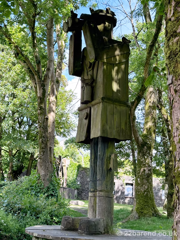 Wooden man with binoculars near the Mill on the Fleet
