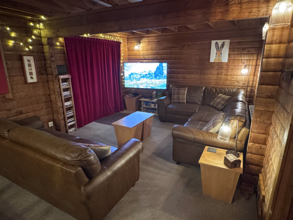 View across lounge with Smart TV on